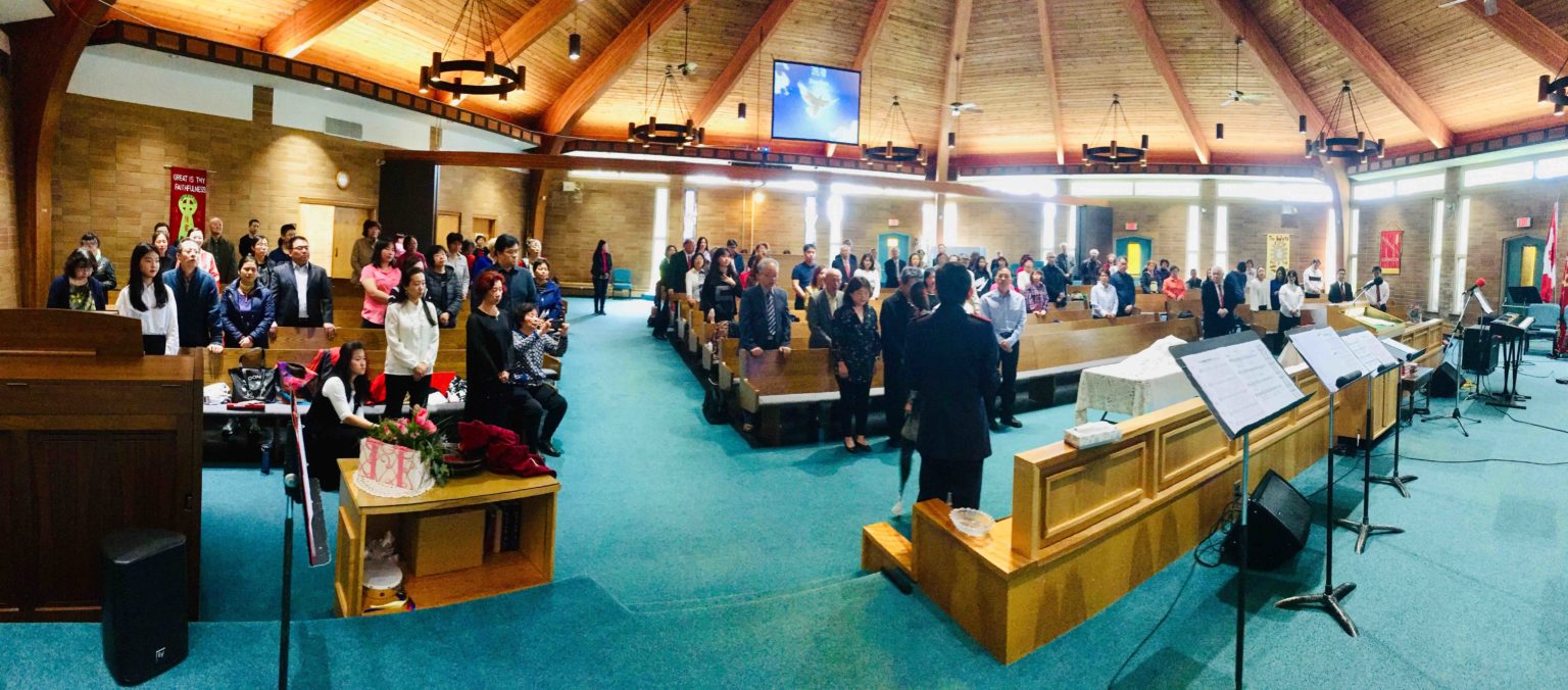 The Salvation Army New Life Church congregation worshipping in the sanctuary