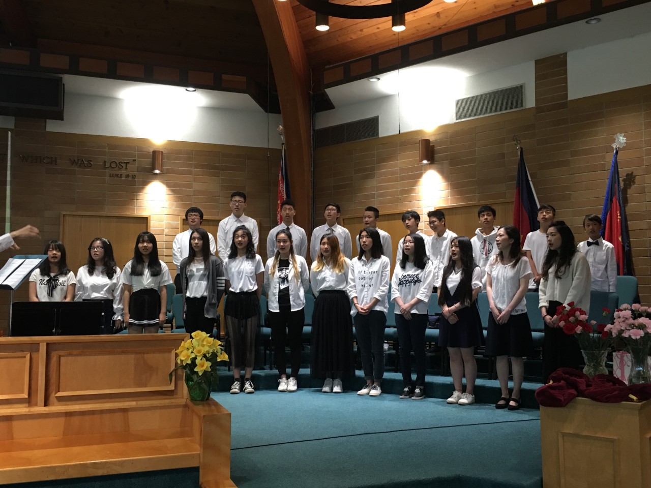 Youth fellowship members singing together at Salvation Army New Life Church